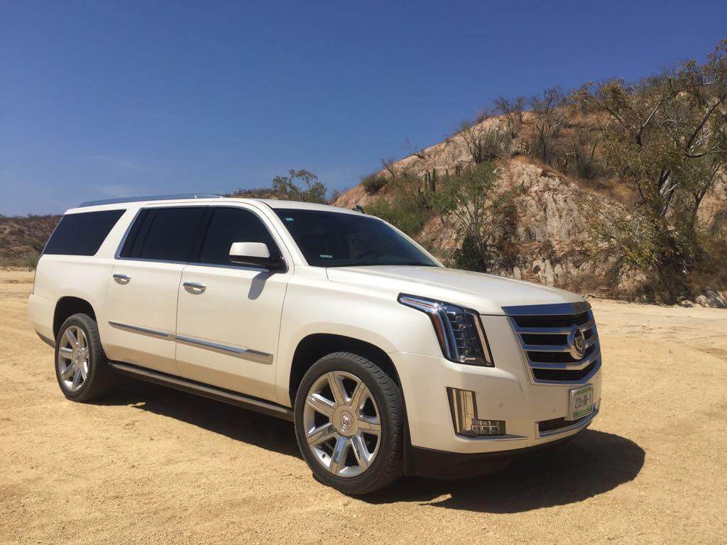 White Escalade around the desert 