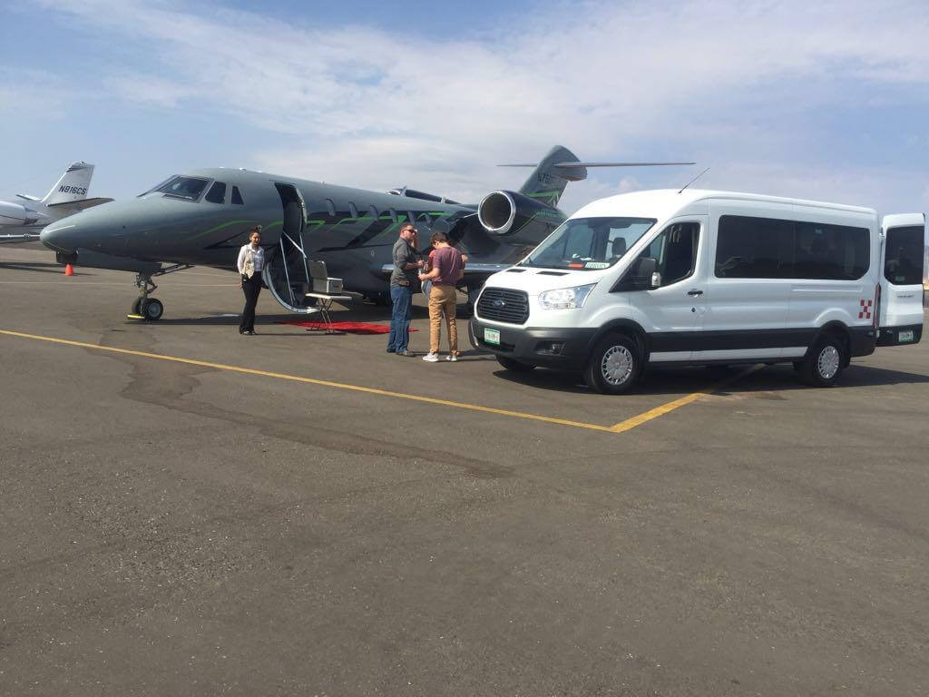 Customers being picked up after arriving in private jet